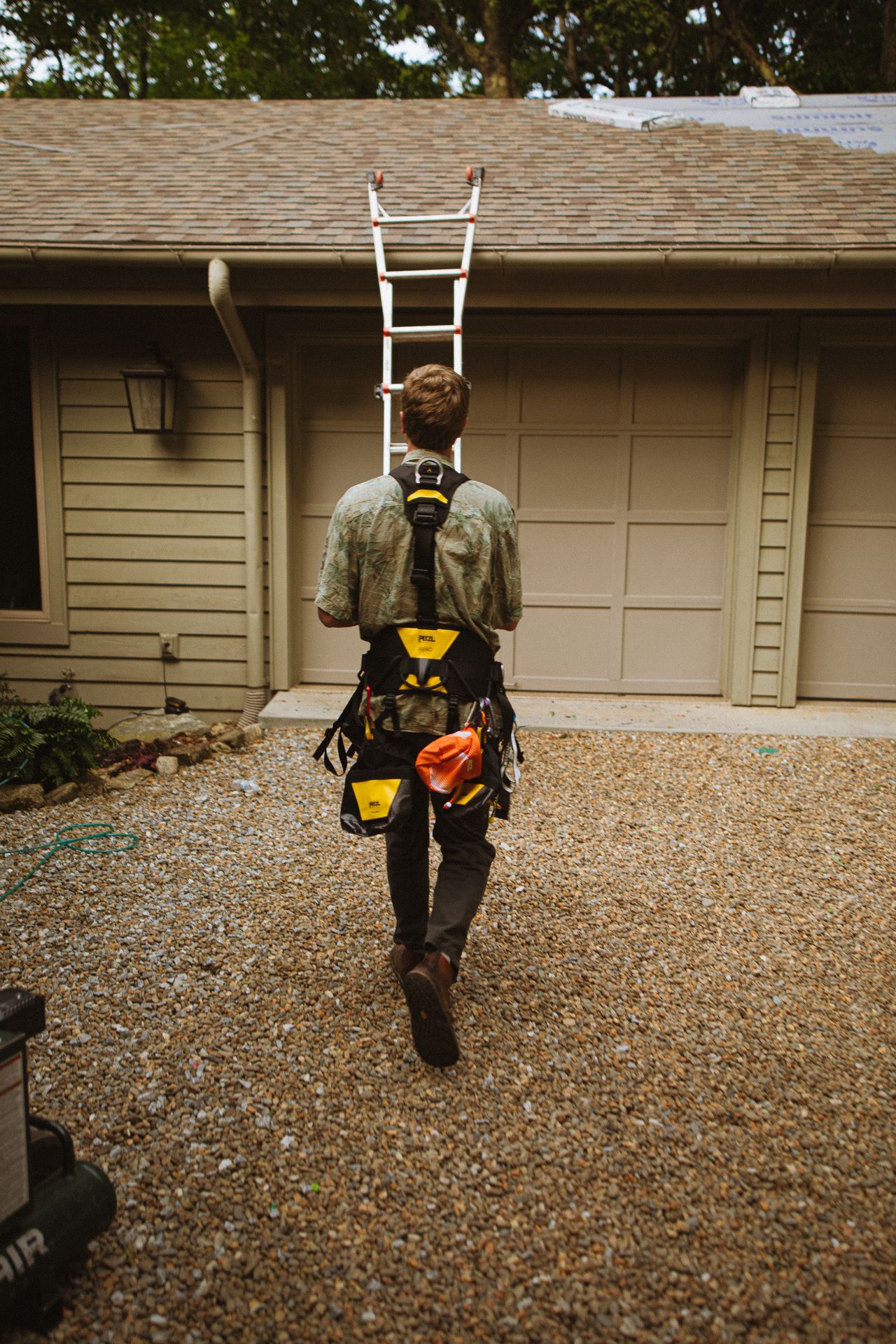 Professional builder walking up to UK property