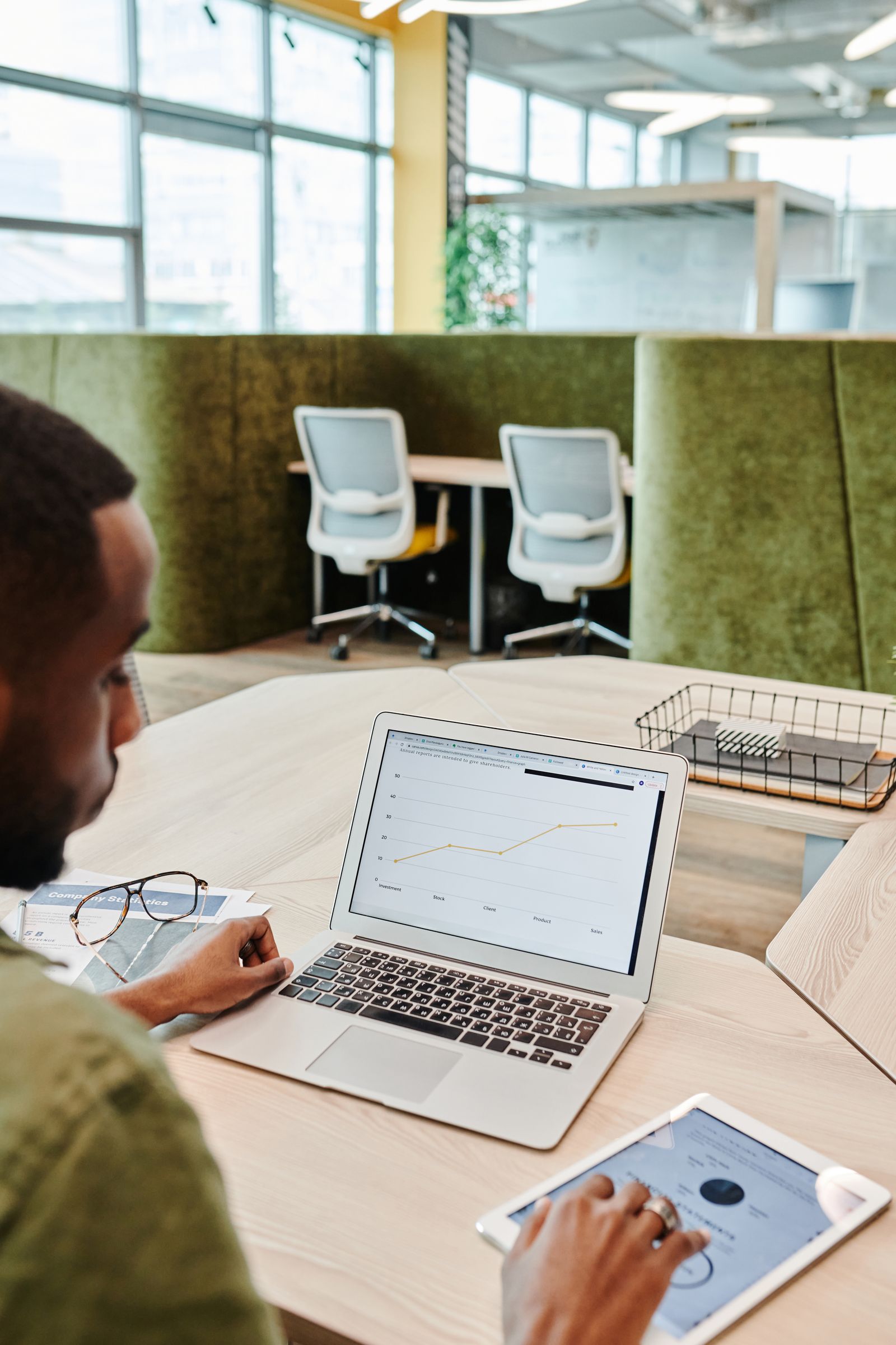 Professional reviewing portfolio analytics